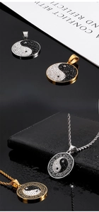 Detailed view of Yin Yang Ba Gua pendant with sparkling black and white cubic zirconia