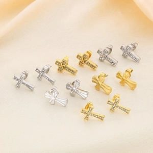 Collection of cross stud earrings in gold and silver with zircon stones and polished finishes