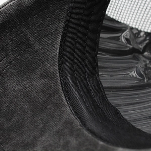 Detail view of the washed baseball cap showing reinforced sweatband and breathable mesh