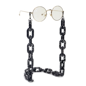 Chaîne à lunettes épaisse en acrylique moucheté noir et blanc avec clips dorés