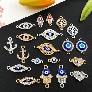 Evil eye pendants in gold and silver finish with rhinestones and enamel for jewelry making