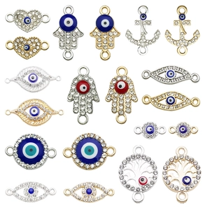 Assorted evil eye charms in gold and silver finish with rhinestones for jewelry making