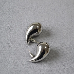 Minimalist silver chunky hollow teardrop stud earrings with a glossy polished mirror finish