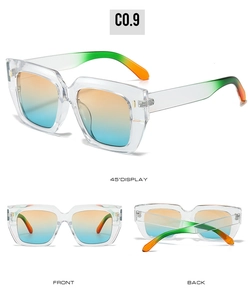 Detail view of square sunglasses with transparent frames and orange-blue gradient lenses