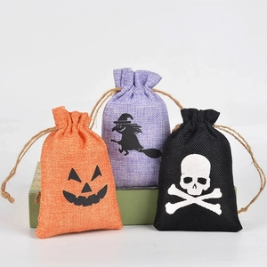 Halloween burlap drawstring gift bags with pumpkin, witch, and skull prints in three colors