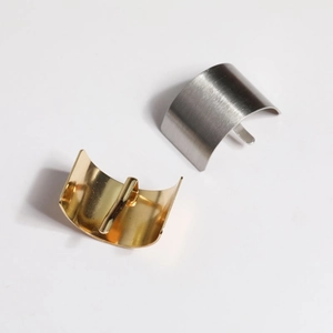 Minimalist brushed metal hair hook ponytail accessory in gold and silver finish