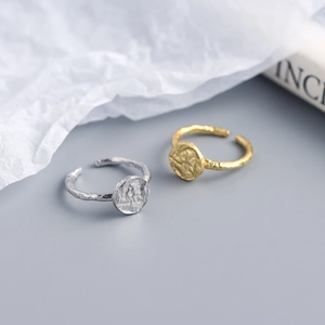 Adjustable S925 sterling silver rings with irregular textured disc in gold and silver