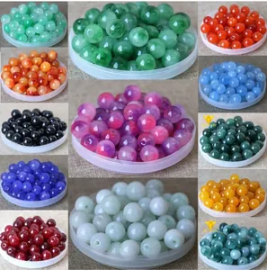 Detailed grid view of assorted colorful round acrylic beads for DIY jewelry making