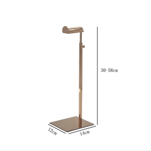 Detail of rose gold metal bag stand with adjustable height from 30cm to 58cm