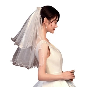 Short two-layer bridal veil with bow ribbon in soft white mesh for wedding hairstyles