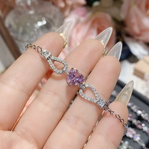 Elegant 18K gold plated bracelet with pink heart gemstone and drop-shaped zircon accents