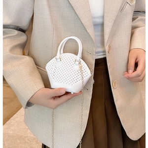 Mini white woven jelly shell bag with golden chain strap for summer fashion style