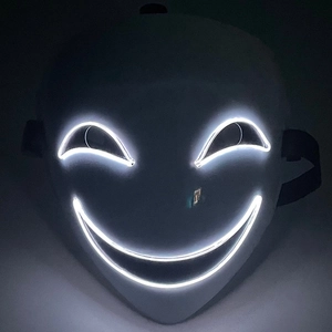 Detail of LED glowing white mask with EL wire crescent eyes and smiling mouth design