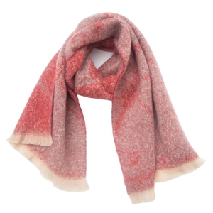 Detail of red floral jacquard scarf featuring delicate short beige tassel fringe edges