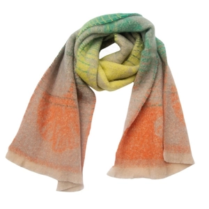 Detailed view of autumn winter boucle yarn scarf with orange gingko leaf jacquard weave