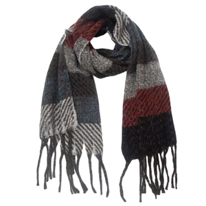 Close-up of wool blend scarf featuring colorful stripes and classic fringe texture