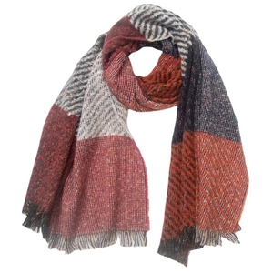 Detail of multi-color plaid scarf featuring wool-knit texture and soft fringe edges