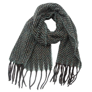 Detail of multi-color woven scarf featuring dark green tassels and twill pattern texture