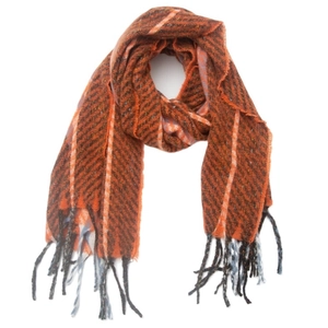 Detail of woven texture on orange striped scarf with brown checkered pattern and tassels