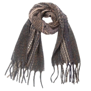 Detail of brown gradient knitted scarf featuring soft textured yarn and fringe tassels
