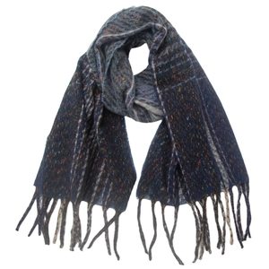 Detail of dark blue knit scarf featuring colorful flecks and classic tassel fringe finish