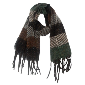 Detail of thick striped knit scarf with plaid patterns and tassel fringe edges