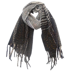 Detail of soft winter scarf featuring mixed grey brown weave with fringe tassels