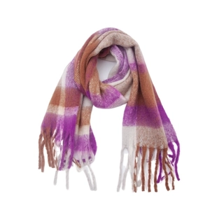 Detailed close-up of thick plaid boucle scarf with fringes in purple and brown