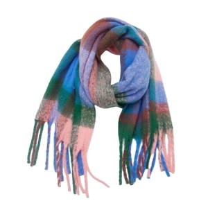 Detailed close-up of multi-color plaid knit scarf with soft fringe edges and texture