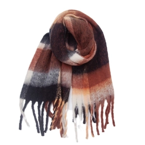 Close-up of winter plaid scarf texture with fringes in brown black and grey color palette