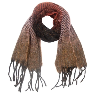 Detailed view of woven scarf featuring gradient colors and decorative tassels on the ends