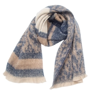Detail of leopard and stripe patchwork scarf with frayed edges in blue and beige tones