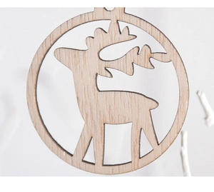 Close-up of laser-cut wooden reindeer ornaments with natural wood grain and textures