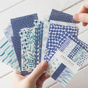 Blue aesthetic material paper set with geometric and botanical patterns for scrapbooking