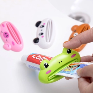 Set of 4 cute cartoon animal toothpaste squeezers including pig, panda, bear and frog