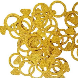 Sparkly gold glitter ring-shaped confetti for wedding and party table decorations