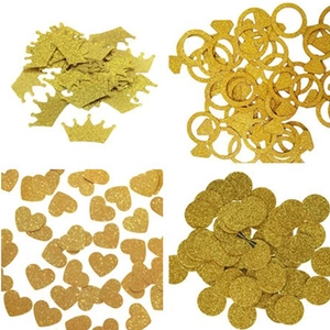 Golden glitter confetti set with crown ring heart and circle shapes for party decor