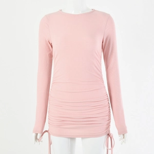 Pink long sleeve ribbed knit bodycon dress with adjustable side drawstrings on white mannequin