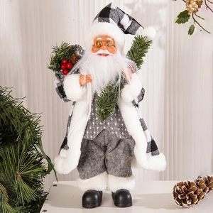 Detailed close-up of a 12-inch Santa Claus figurine with festive plaid and pine needles