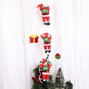 Detailed view of three Santa Claus figures climbing a white wooden ladder hanging on a curtain