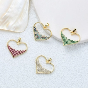 Detailed view of colorful 18K gold-plated heart pendants with micro-pave crystal inlay