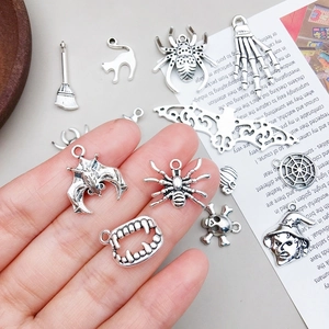 Assorted Halloween vintage silver alloy pendants including bat, spider and skull designs