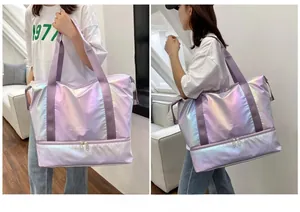 Detail view of large holographic purple travel bag with waterproof dry wet separation base