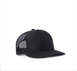 Side view of black mesh trucker hat showing breathable structure and curved brim