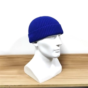 Unisex blue knitted skullcap beanie hat for winter hip hop style on model head