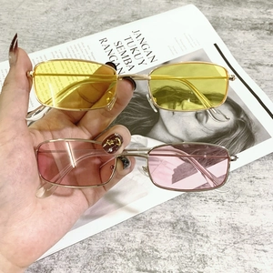 Retro rectangular metal frame sunglasses with light yellow and pink tinted lenses for fashion