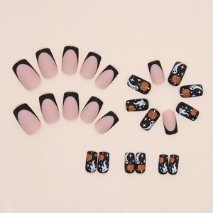 Matte Halloween press-on nails featuring black and orange pumpkin and ghost designs