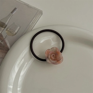 Pink gradient resin rose hair tie decoration detail on elastic black band