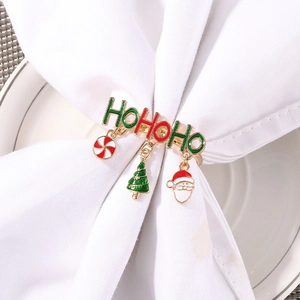 Festive gold napkin ring with HOHOHO letters and Christmas enamel pendants