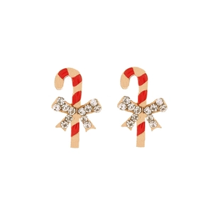 Detailed macro of candy cane earrings with red enamel stripes and crystal bows